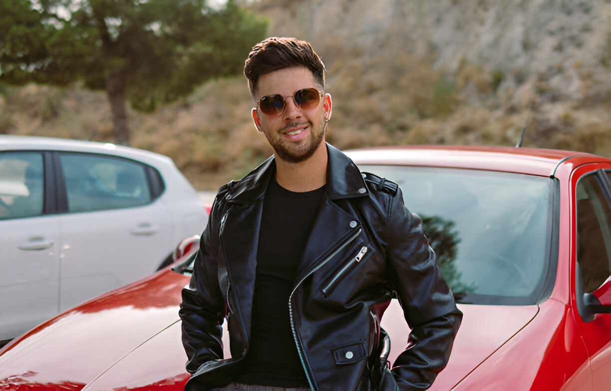 Our Story 2 a man wearing leather jacket