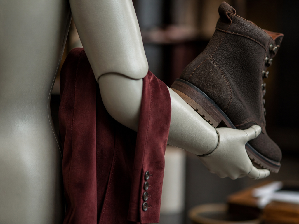 Comparison of durable nubuck boot and soft suede jacket textures.