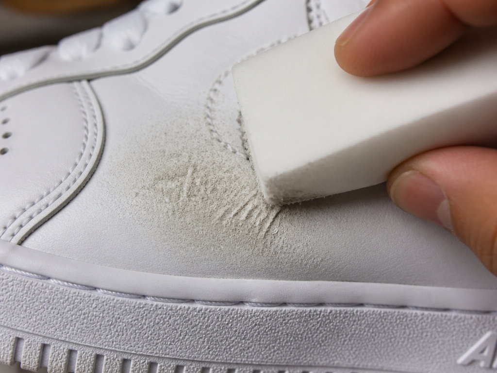 Magic Eraser damaging white leather sneaker by scuffing the finish