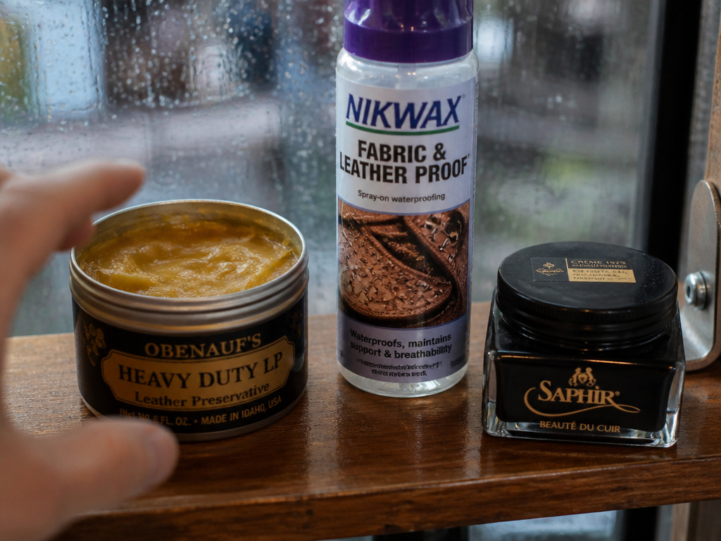 Choosing between wax, spray, and cream protectors for leather shoes in rain.
